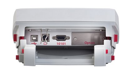 Zadní strana displeje. Rozhraní RS232, USB host pro připojení k PC nebo tiskárně, vstup pro propojovací kabel se základnou váhy.