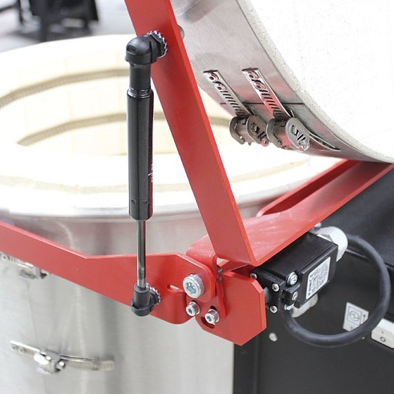 Víko s plynovou vzpěrou a koncovým spínačem.